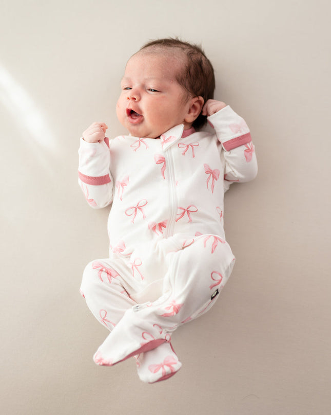 Kyte Baby Zippered Footie in Bow