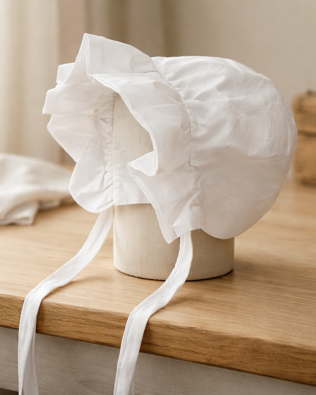 Classic White Baby Bonnet with Ruffle Trim & Tie Closure