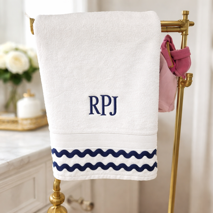 Personalized luxury white towel gift set with navy trim — custom embroidered initials, ready to gift