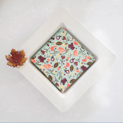 Nora Fleming Candy Napkin Holder — styled with napkins and minis