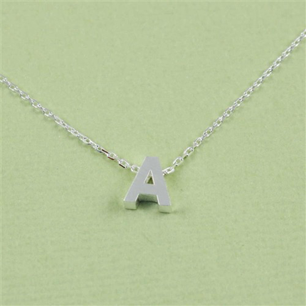 Block letter initial necklace — shown on model