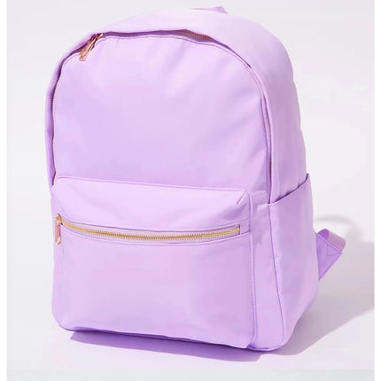 The Jules nylon backpack — shown from back angle