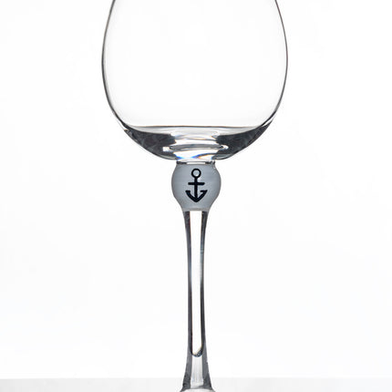 The Giving Glass Anchor — lifestyle shot on table