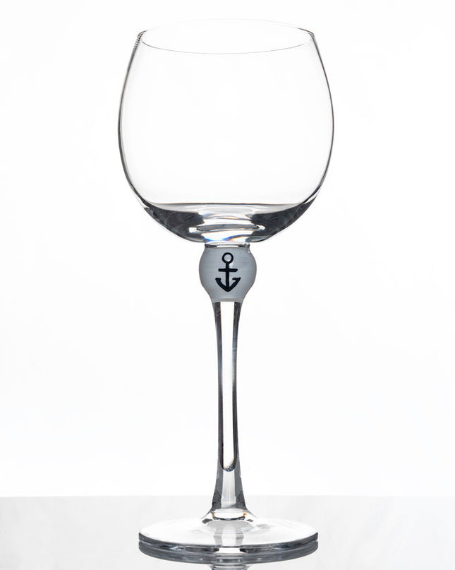 The Giving Glass Anchor — lifestyle shot on table