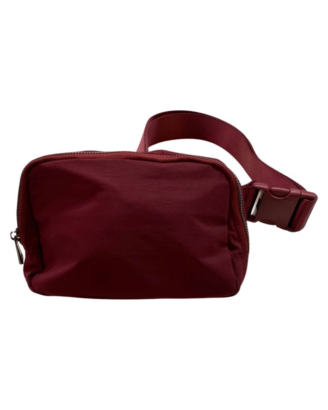 The Keely belt bag — shown being worn around waist