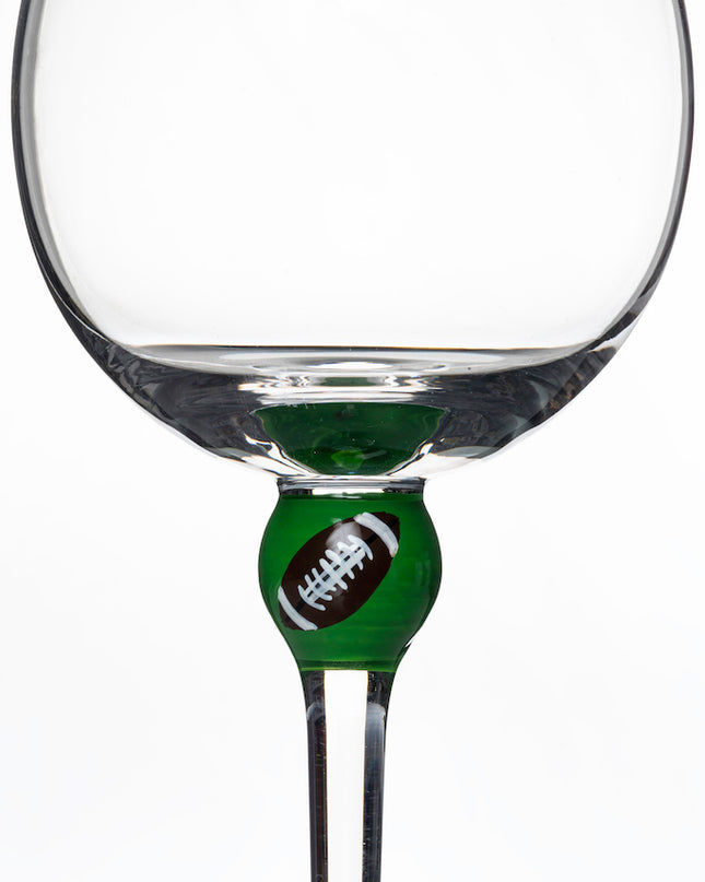 The Giving Glass Football — lifestyle shot on table